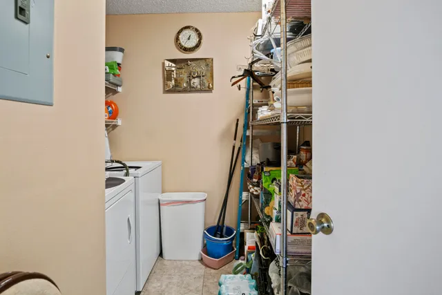 a bathroom with a toilet a sink and a window