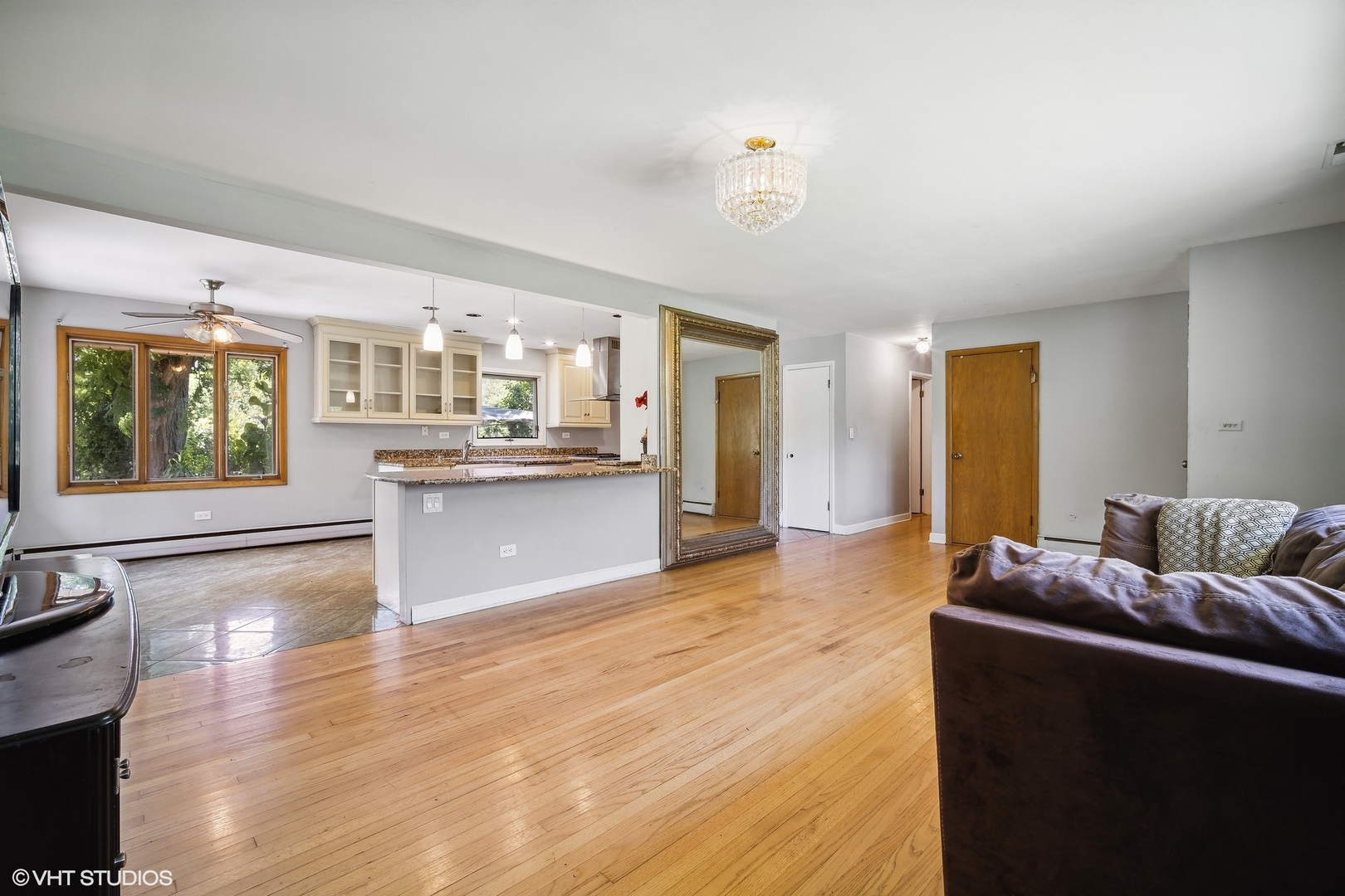 2000 Beechnut Road Northbrook, IL 60062 - Photo 4 of 22 a living room with stainless steel appliances granite countertop a couch and wooden floor