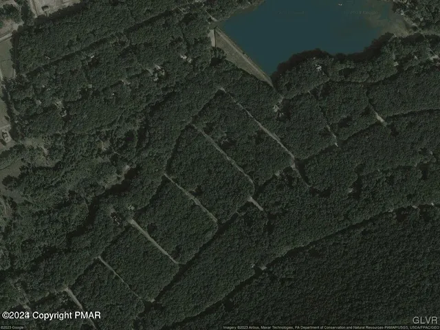 a view of swimming pool and a yard