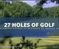 a view of room with trees and a snow