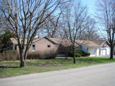 2945 Decatur Street Lake Station, IN 46405 - Photo 2 of 10 a front view of a house with a garden and trees