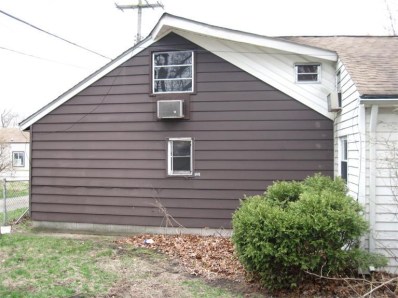 2945 Decatur Street Lake Station, IN 46405 - Photo 5 of 10 a front view of a house with garden