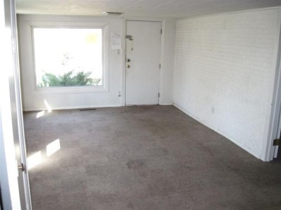 2945 Decatur Street Lake Station, IN 46405 - Photo 7 of 10 a view of an empty room with a window