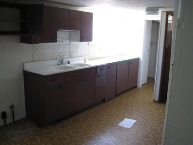 2945 Decatur Street Lake Station, IN 46405 - Photo 10 of 10 a bathroom with a sink and a mirror