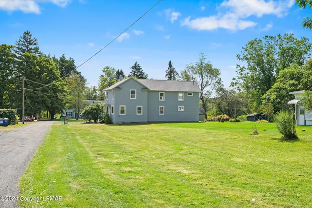 a house view with a garden space