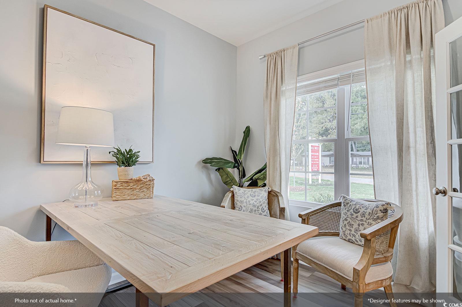 383 Gdn Grv Street Conway, SC 29526 - Photo 4 of 8 Dining area featuring wood finished floors