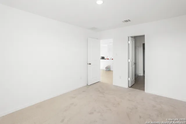 a view of a room with an empty space