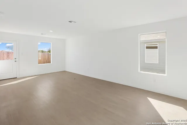 an empty room with a window