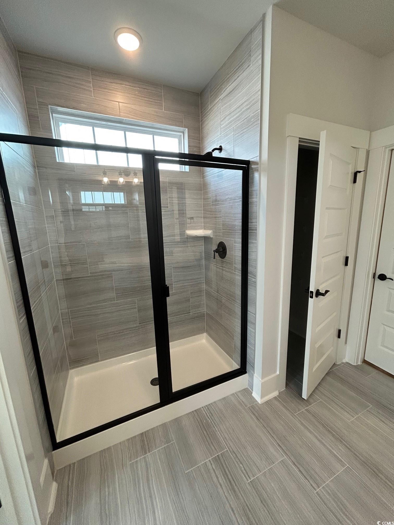 622 Braselton Lane Myrtle Beach, SC 29588 - Photo 9 of 15 Full bathroom featuring a shower stall