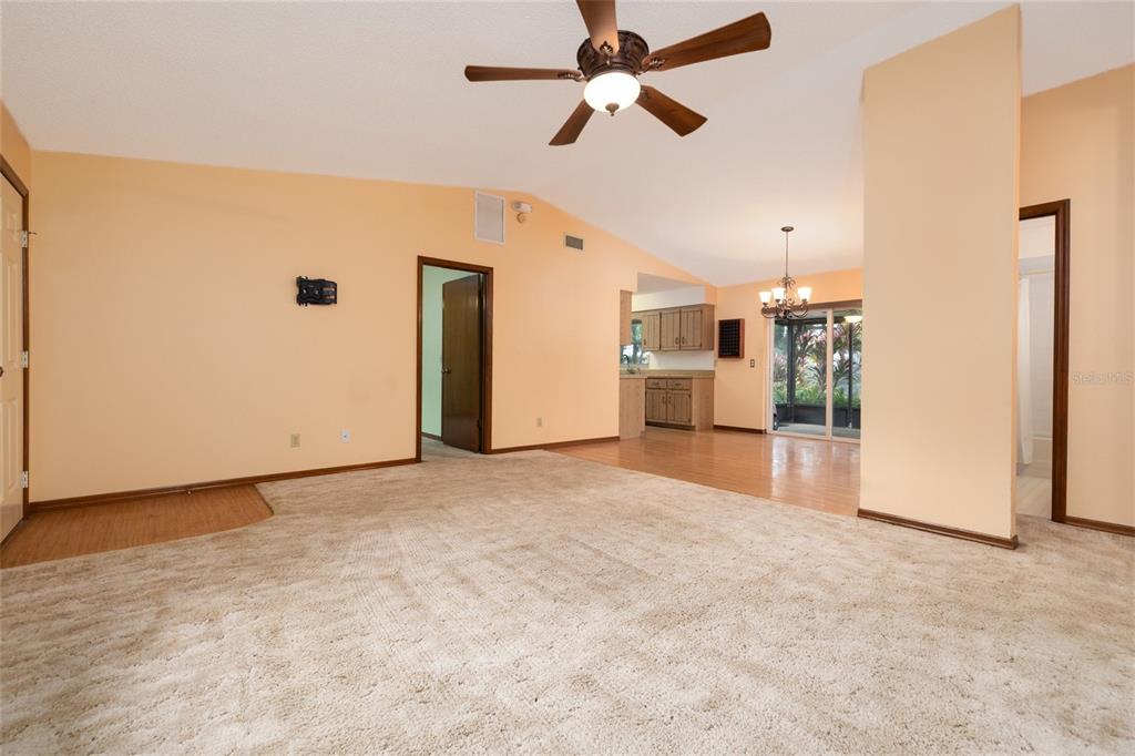 3221 Lime Tree Drive Edgewater, FL 32141 - Photo 12 of 28 a view of a kitchen with a sink and a refrigerator