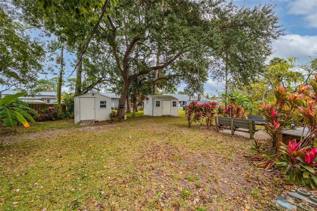 3221 Lime Tree Drive Edgewater, FL 32141 - Photo 28 of 29 a house with trees in front of it