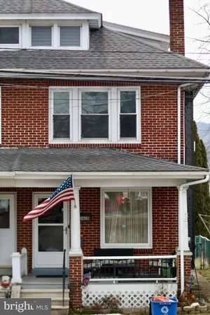 a front view of a house with a door