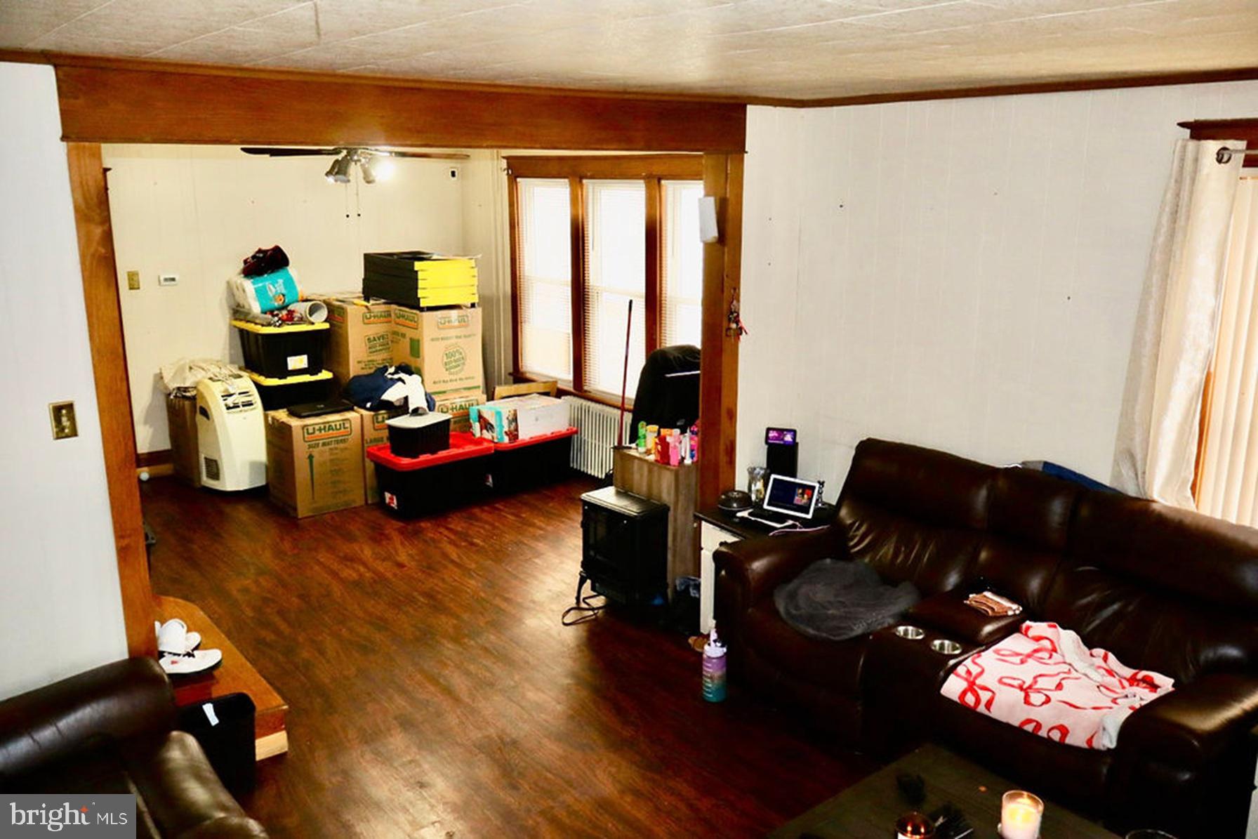 3420 Penn Avenue Sinking Spring, PA 19608 - Photo 8 of 34 a living room with furniture fireplace and a large window