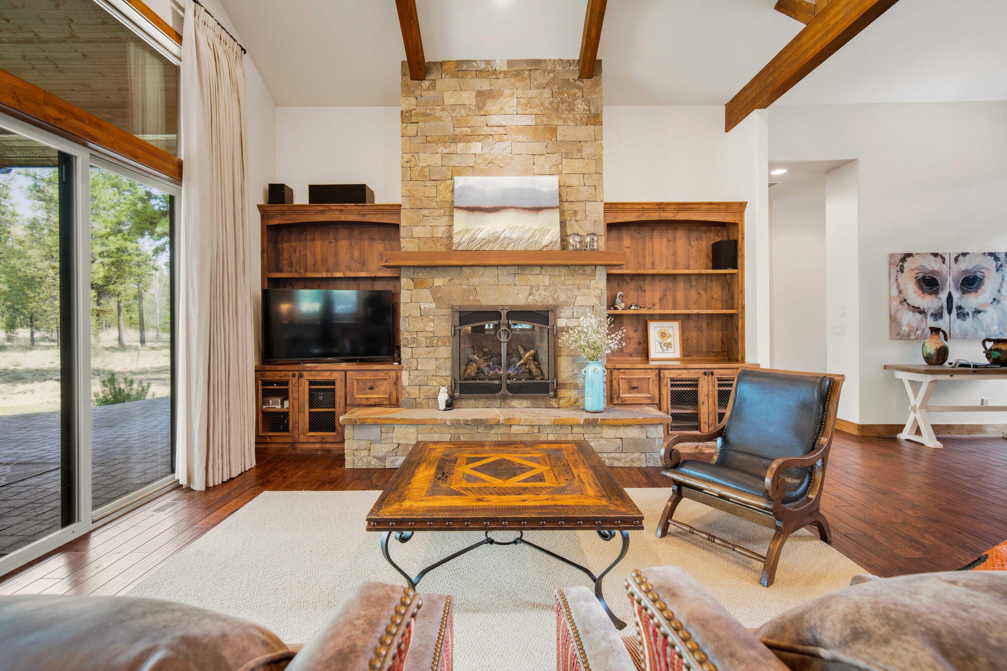 56328 Fireglass Loop Bend, OR 97707 - Photo 4 of 72 Natural stone gas fireplace in the great room.