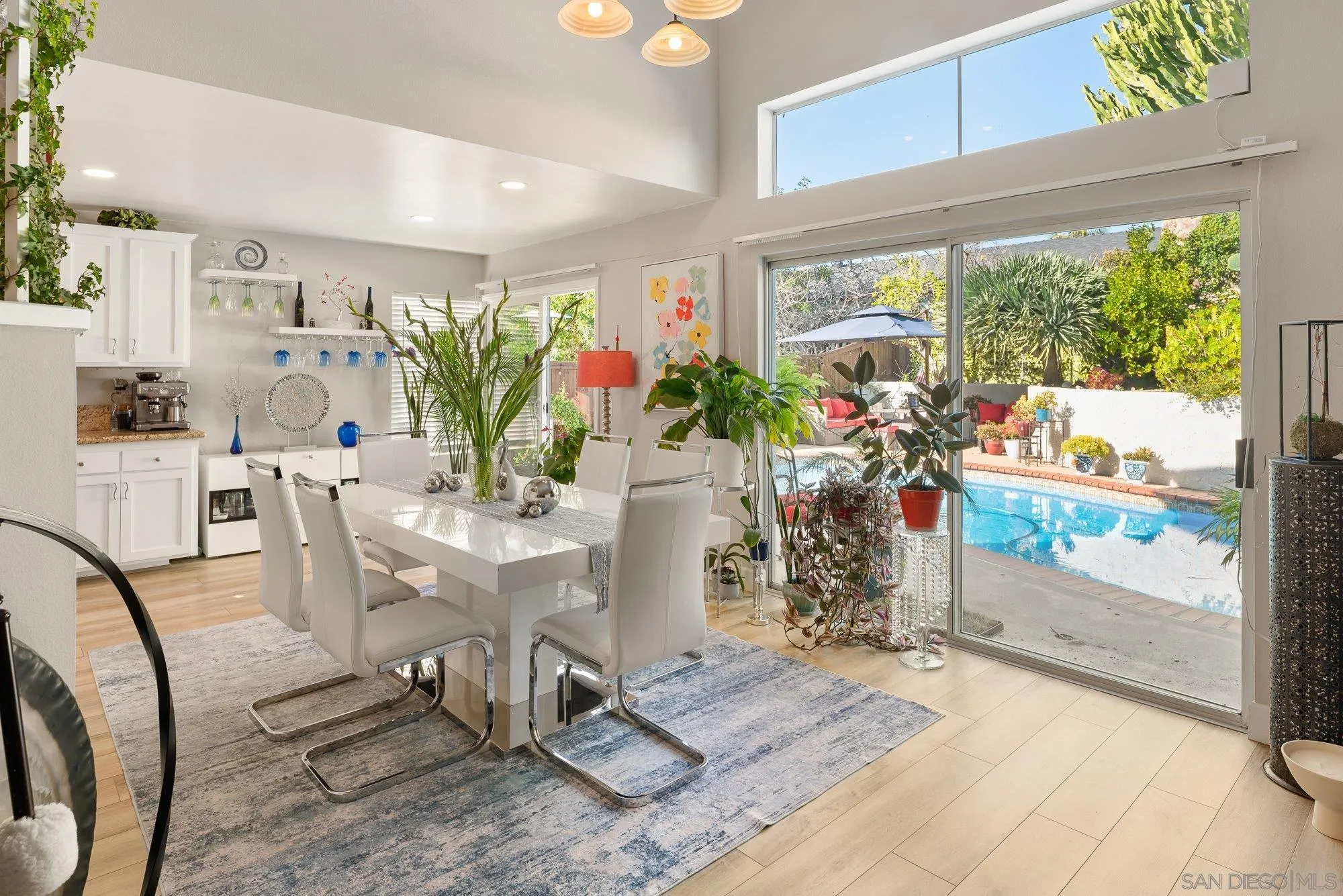 3598 Old Cobble Road San Diego, CA 92111 - Photo 11 of 42 a view of a dining room with furniture window and outside view