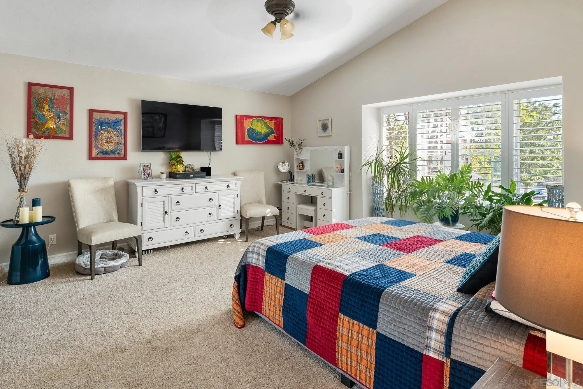 3598 Old Cobble Road San Diego, CA 92111 - Photo 27 of 42 a bedroom with a bed and a flat screen tv