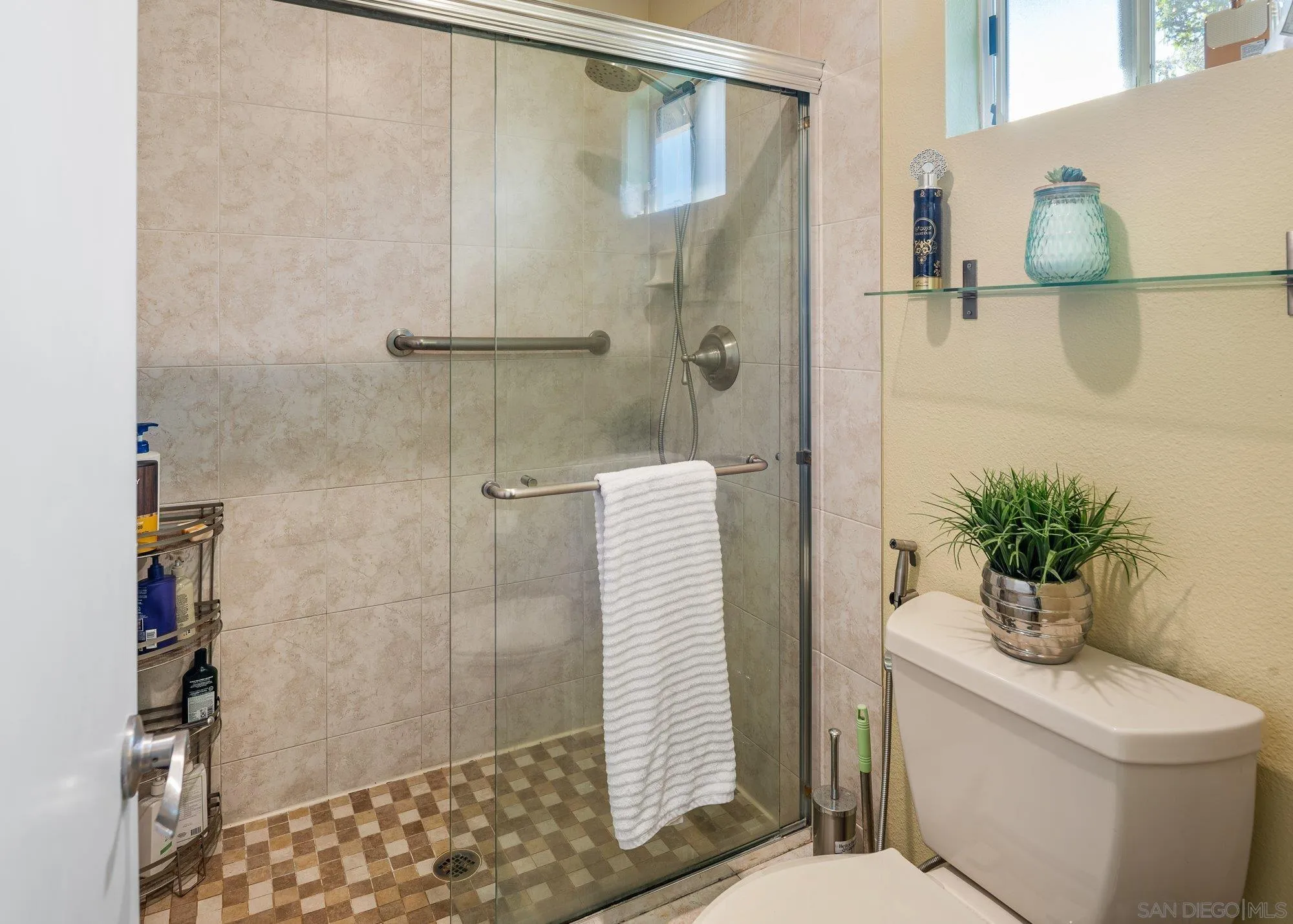 3598 Old Cobble Road San Diego, CA 92111 - Photo 29 of 42 a bathroom with a sink and toilet