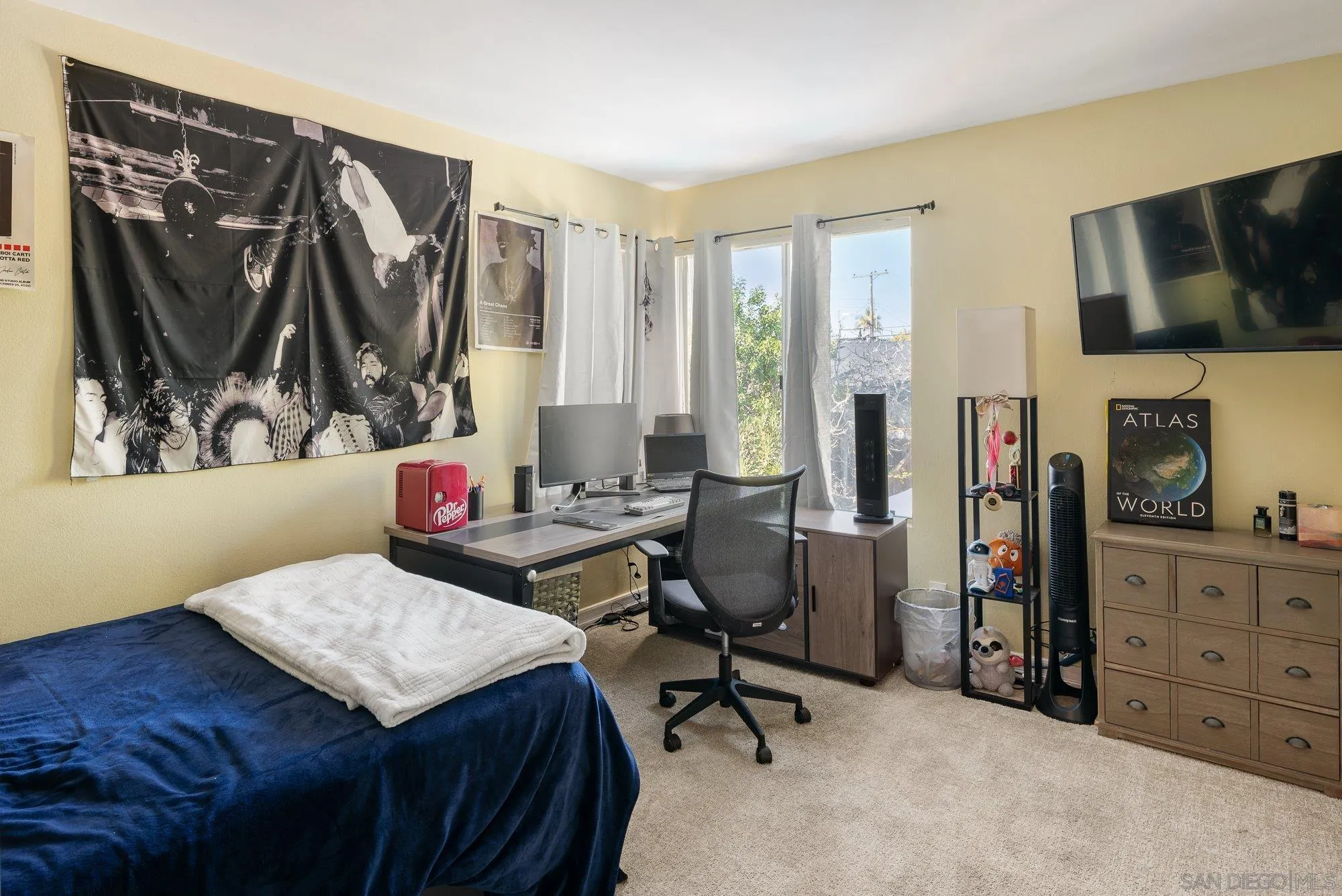 3598 Old Cobble Road San Diego, CA 92111 - Photo 33 of 42 a view of a workspace with furniture and a window