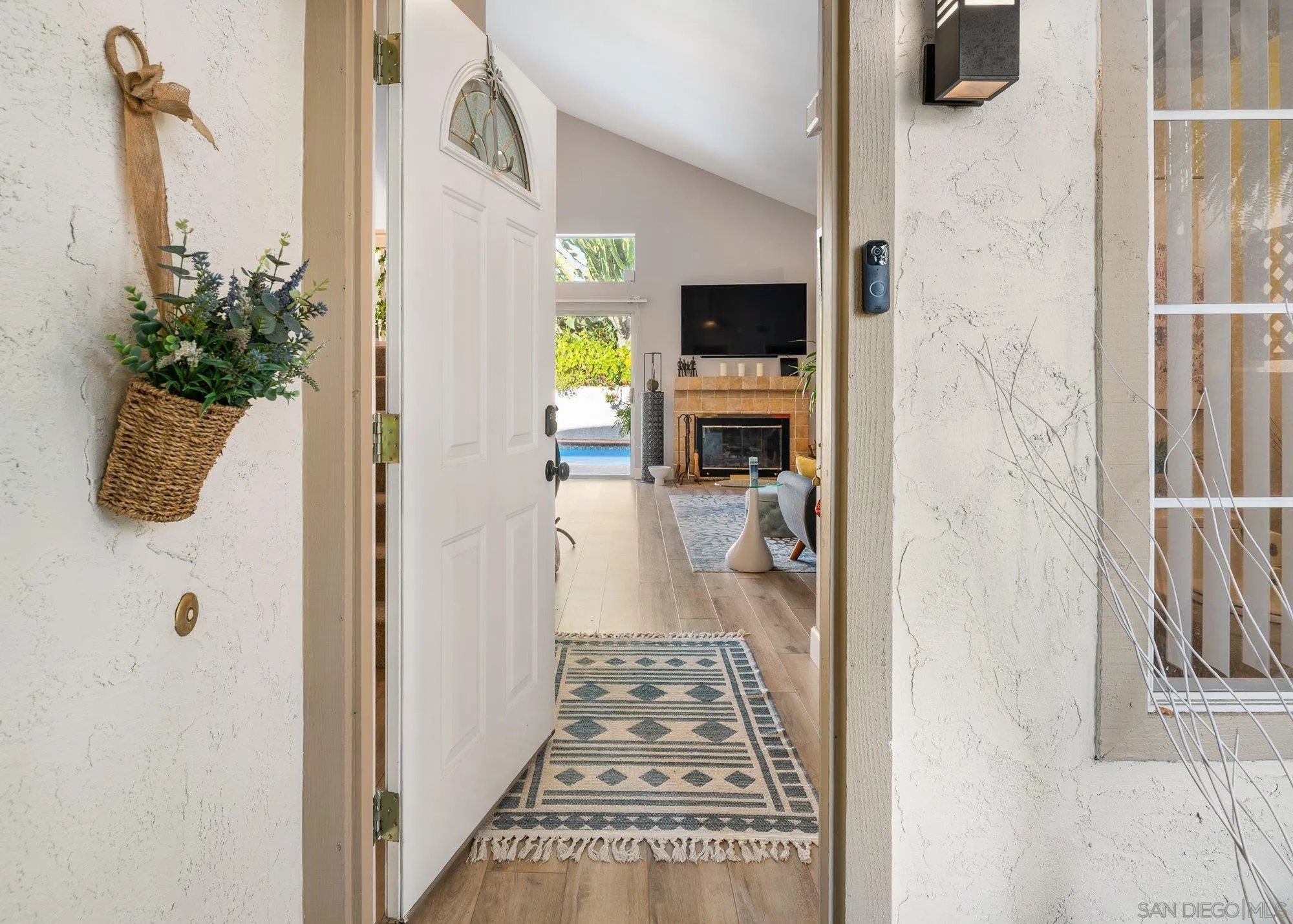 3598 Old Cobble Road San Diego, CA 92111 - Photo 5 of 42 a hallway with of the kitchen view
