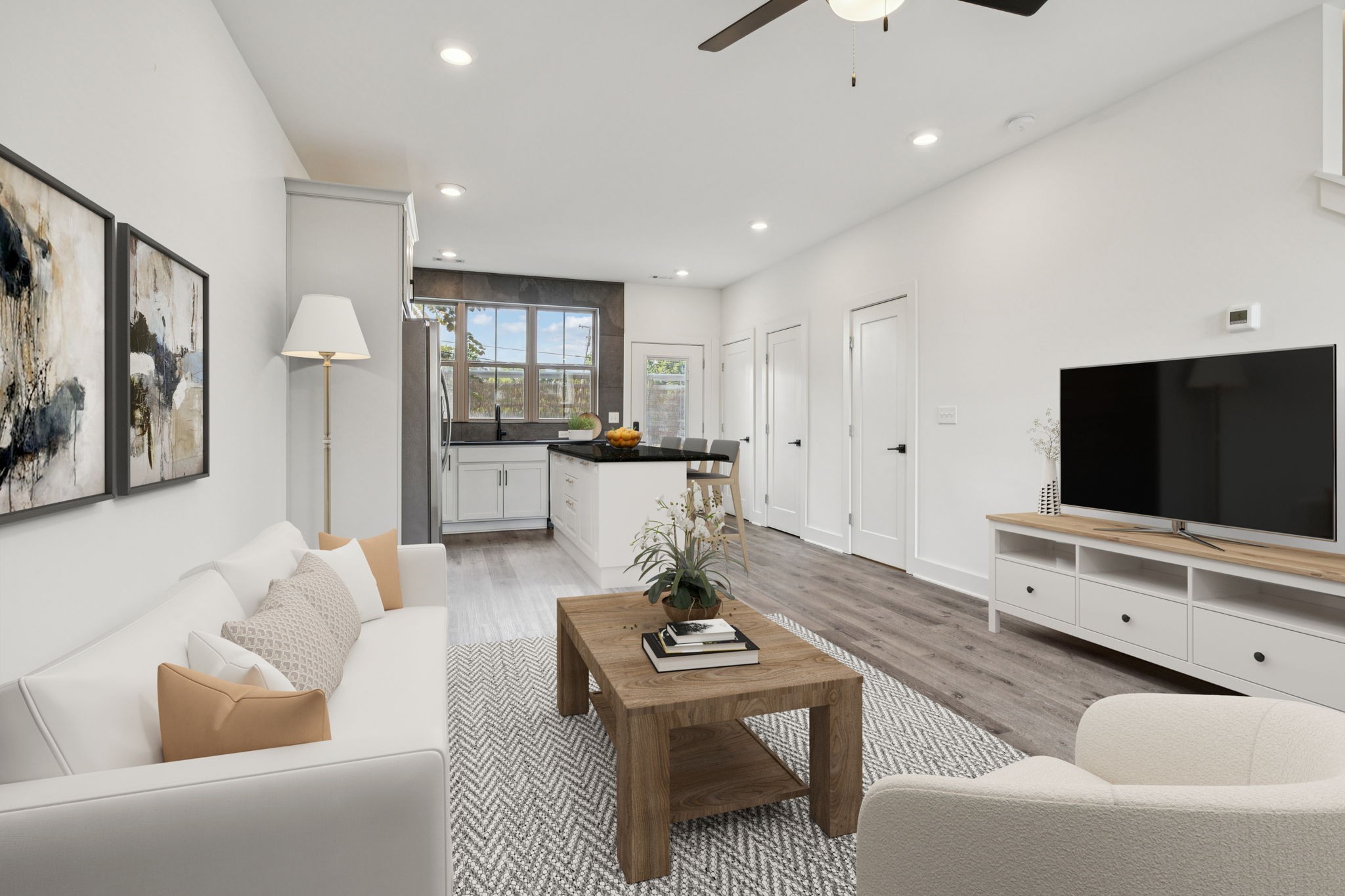 100 Thompson Lane, Unit 9 Nashville, TN 37211 - Photo 3 of 22 a living room with furniture and a flat screen tv