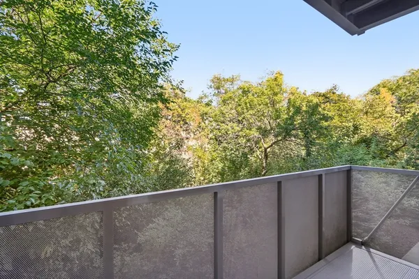 a view of a fence from a balcony