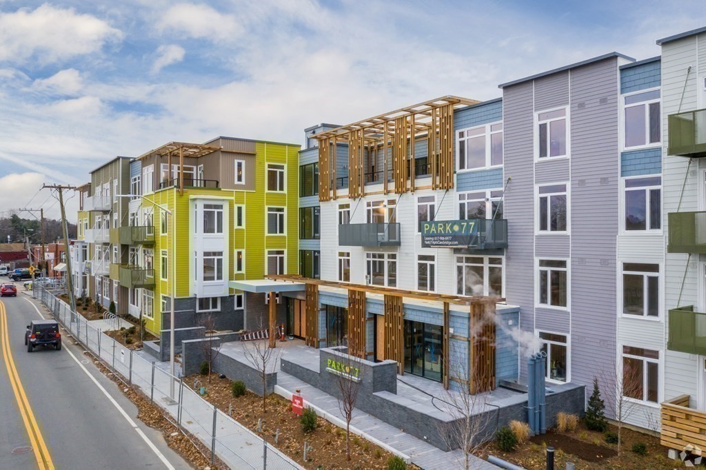 77 New Street, Unit 214 Cambridge, MA 02138 - Photo 8 of 25 a front view of a building with glass windows