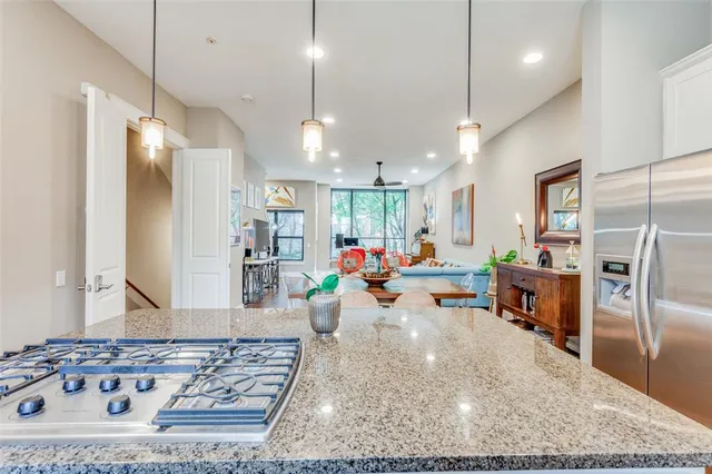 a view of a living room and dining room