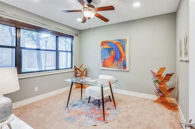 a workspace with furniture and window