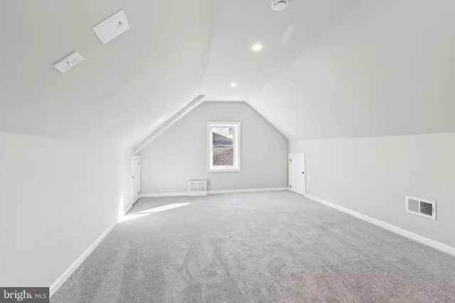 an empty room with a natural light