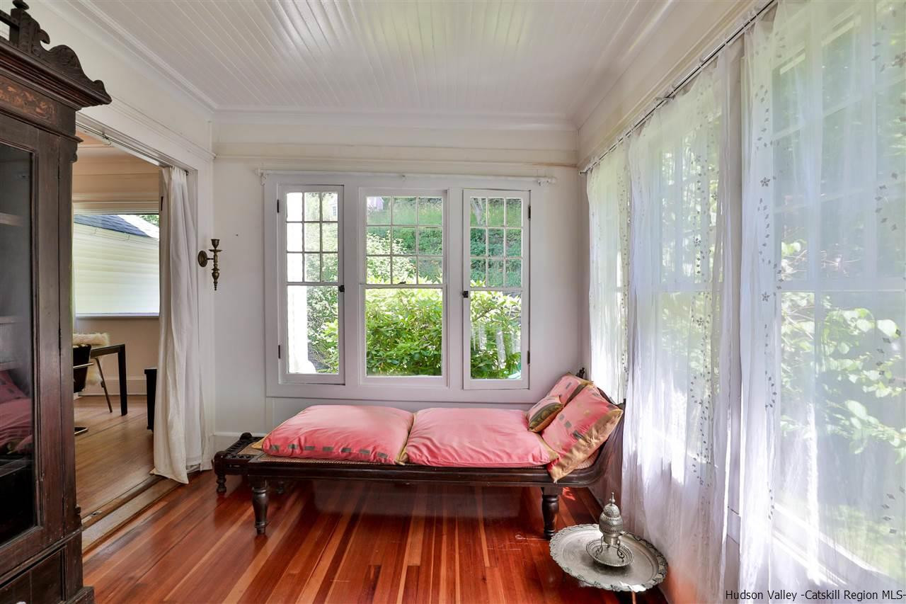 455 Main Street Fleischmanns, NY 12430 - Photo 14 of 35 a bed sitting in a bedroom next to a window