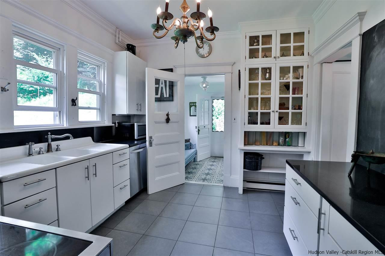 455 Main Street Fleischmanns, NY 12430 - Photo 16 of 35 a kitchen with a refrigerator and a sink