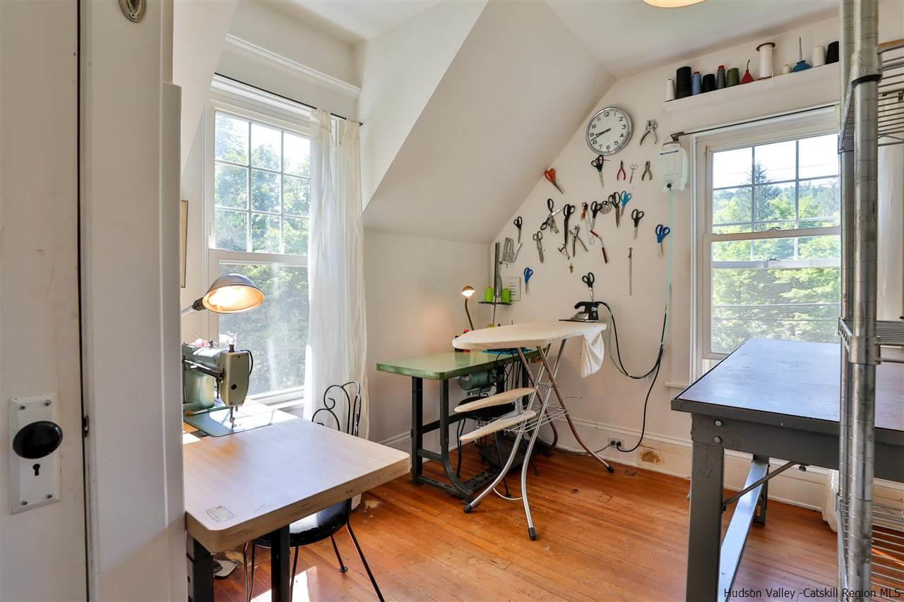 455 Main Street Fleischmanns, NY 12430 - Photo 21 of 35 a view of a workspace with furniture and a window