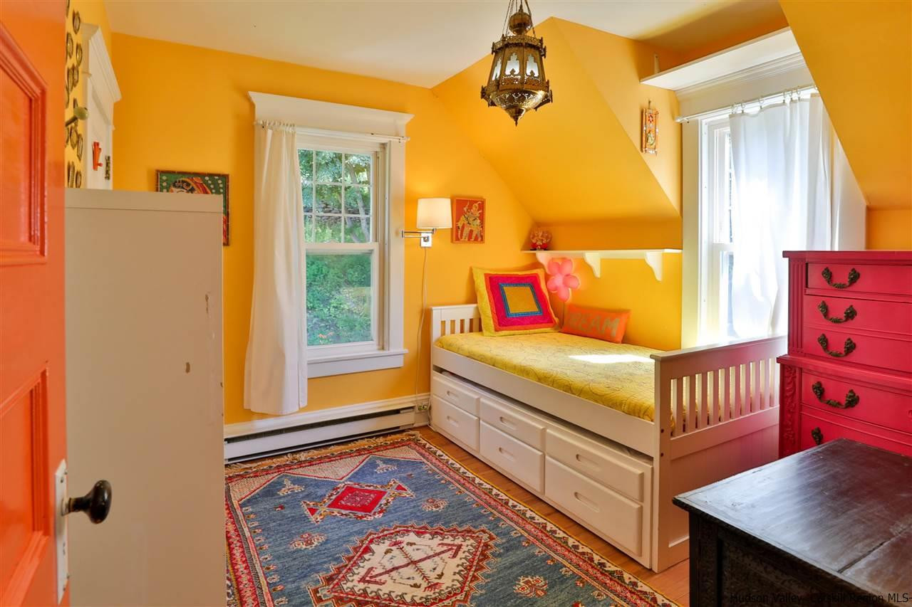 455 Main Street Fleischmanns, NY 12430 - Photo 25 of 35 a bedroom with a bed and wooden floor