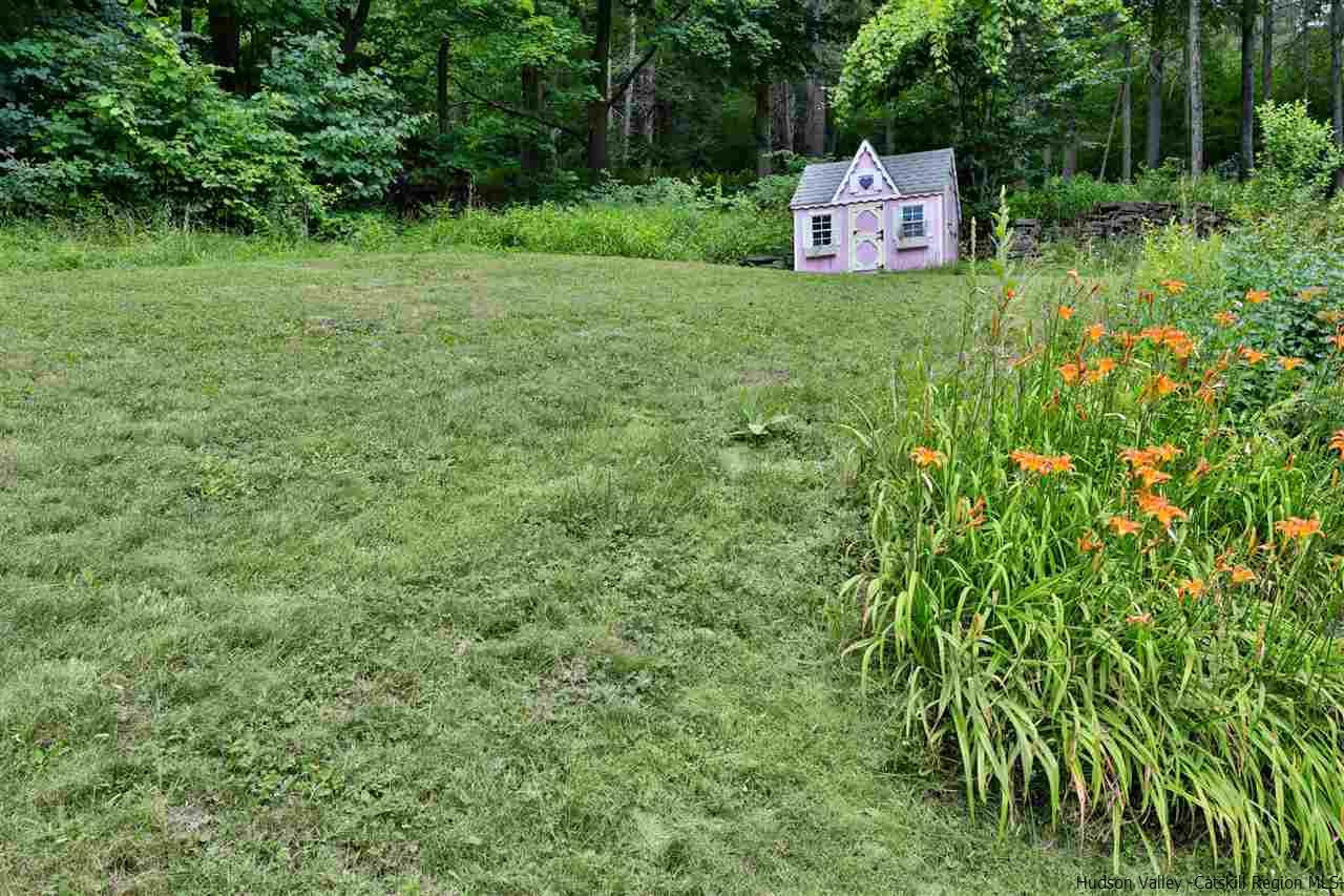 455 Main Street Fleischmanns, NY 12430 - Photo 31 of 35 a sign board with a house in a yard