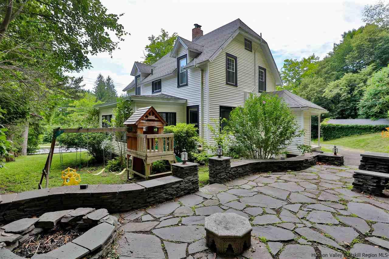 455 Main Street Fleischmanns, NY 12430 - Photo 32 of 35 a front view of a house with a yard and potted plants