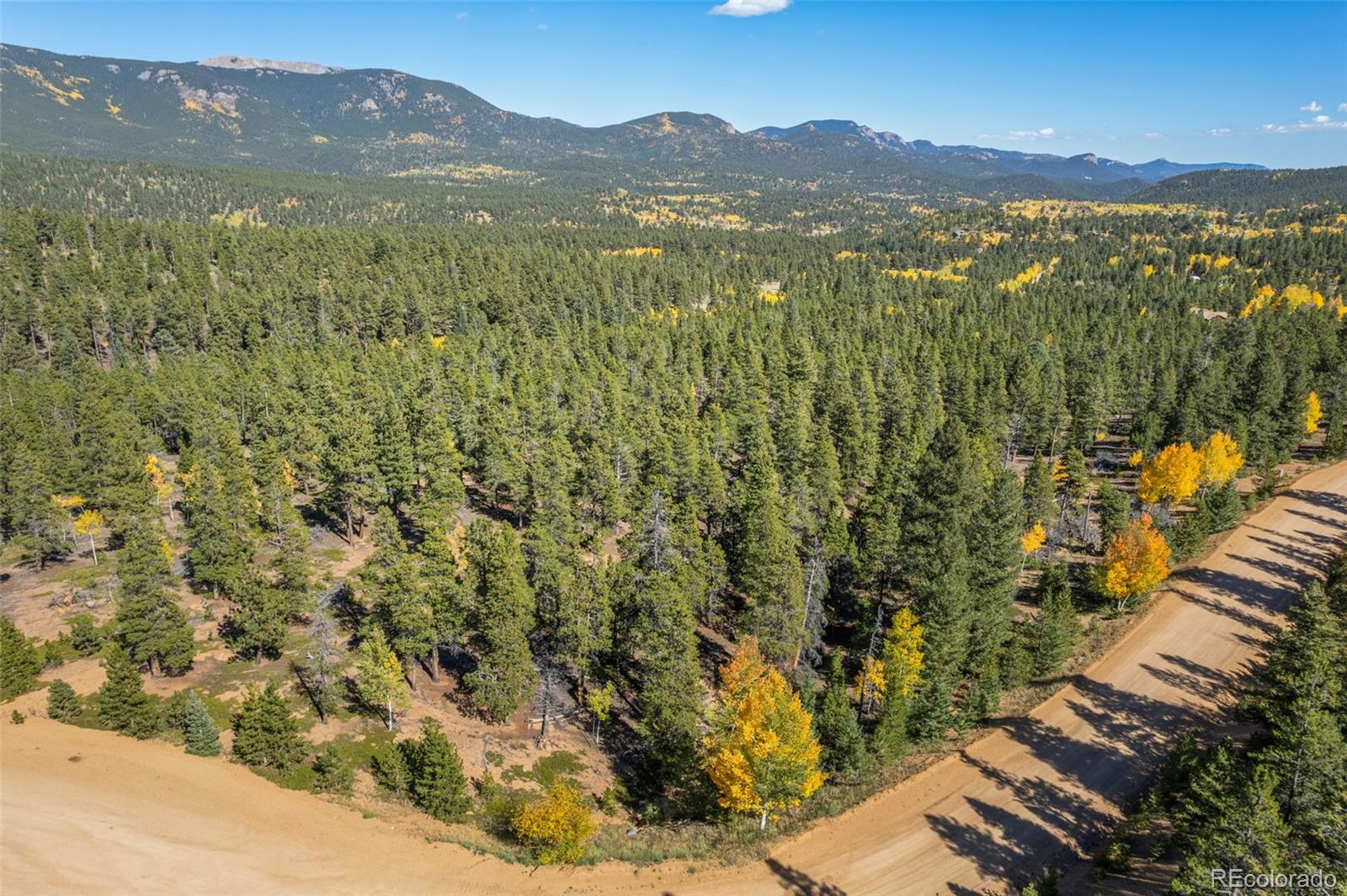 1001 Royal Ridge Drive Bailey, CO 80421 - Photo 14 of 25 a view of a town with mountains in the background