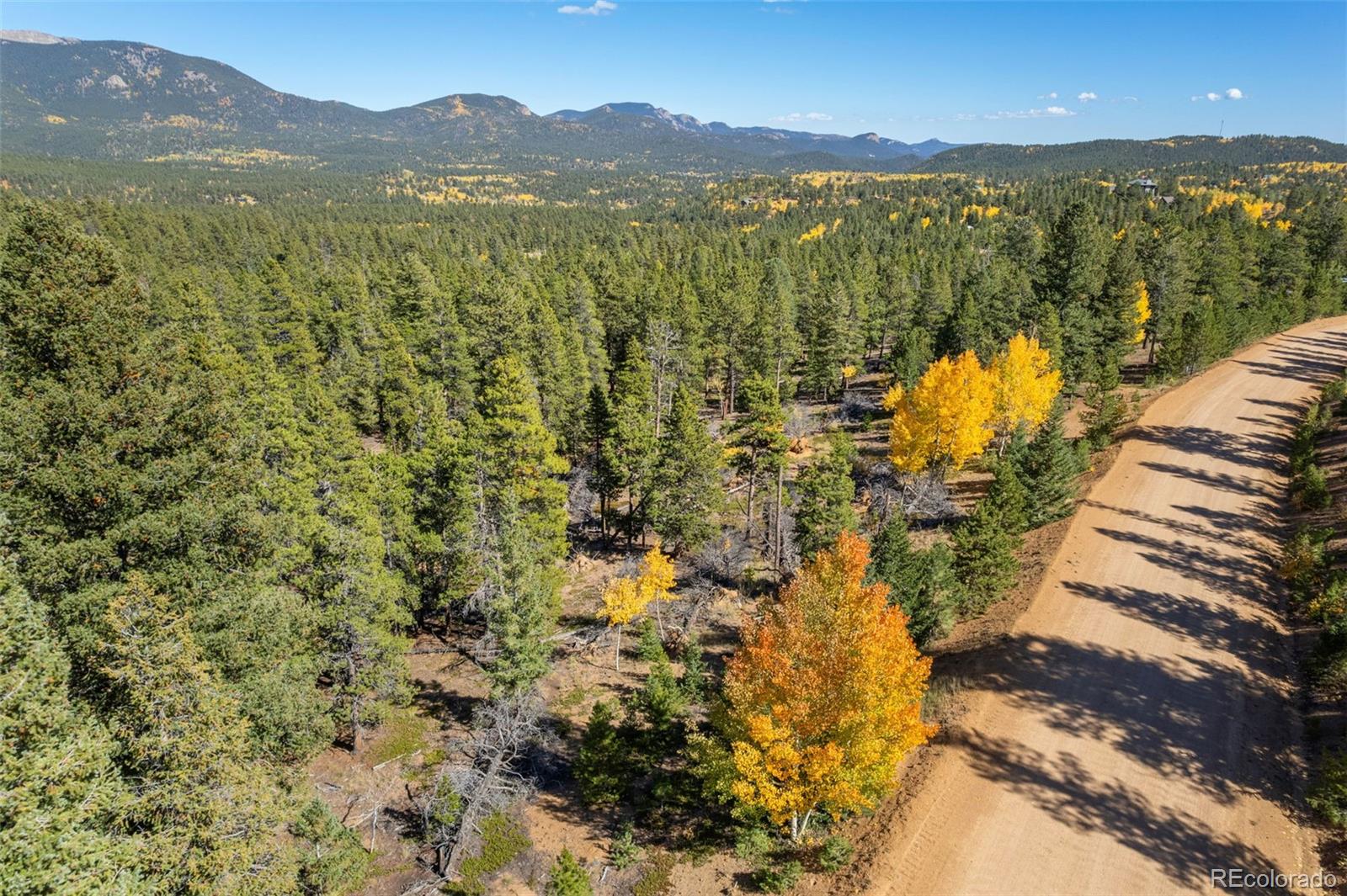 1001 Royal Ridge Drive Bailey, CO 80421 - Photo 6 of 25 a view of lake and mountain