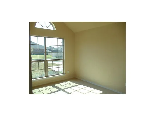 a view of a room that has a window in it