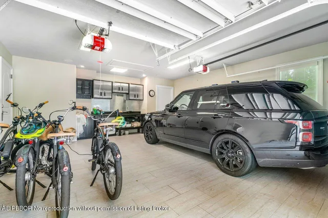 a view of parking garage with cars