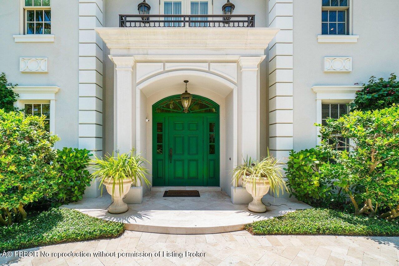 134 Seagate Road Palm Beach, FL 33480 - Photo 3 of 29 a view of a house with potted plants