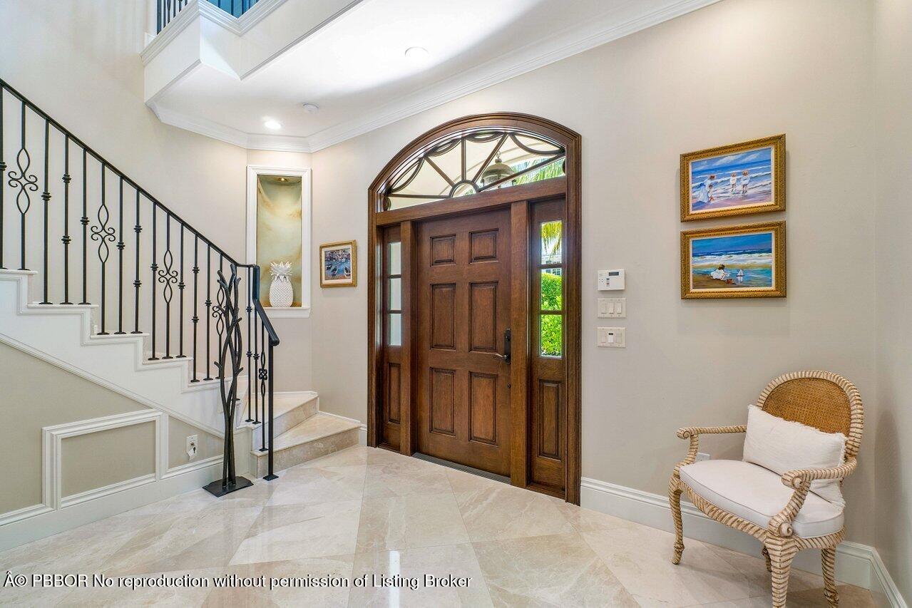 134 Seagate Road Palm Beach, FL 33480 - Photo 4 of 29 a view of entryway with furniture and wooden floor