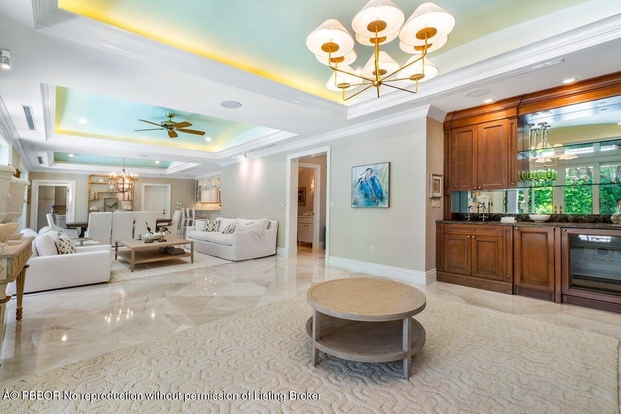 134 Seagate Road Palm Beach, FL 33480 - Photo 7 of 29 a living room with furniture and a large window