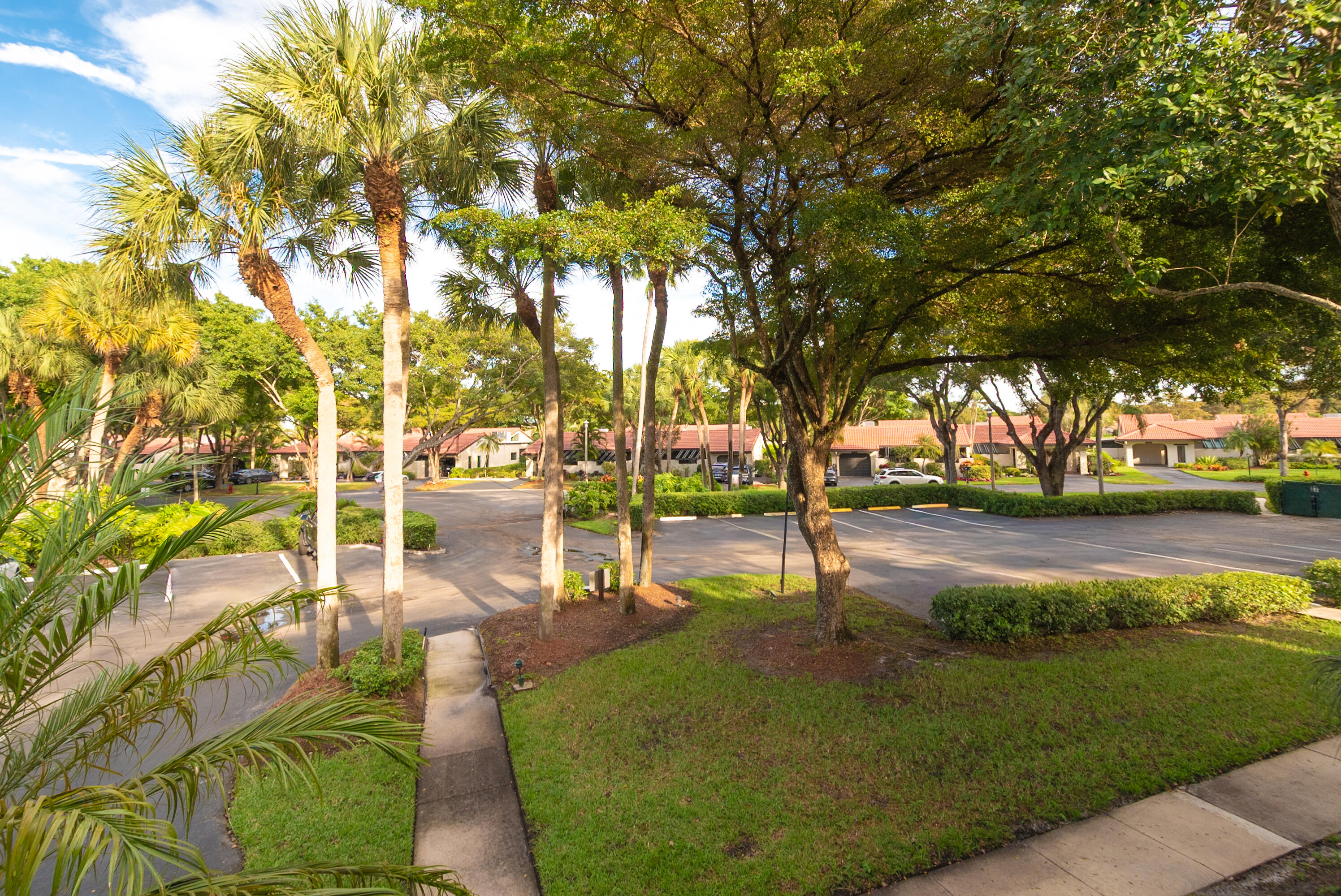 21703 Tall Palm Circle, Unit 5D Boca Raton, FL 33433 - Photo 29 of 36 Parking at the door