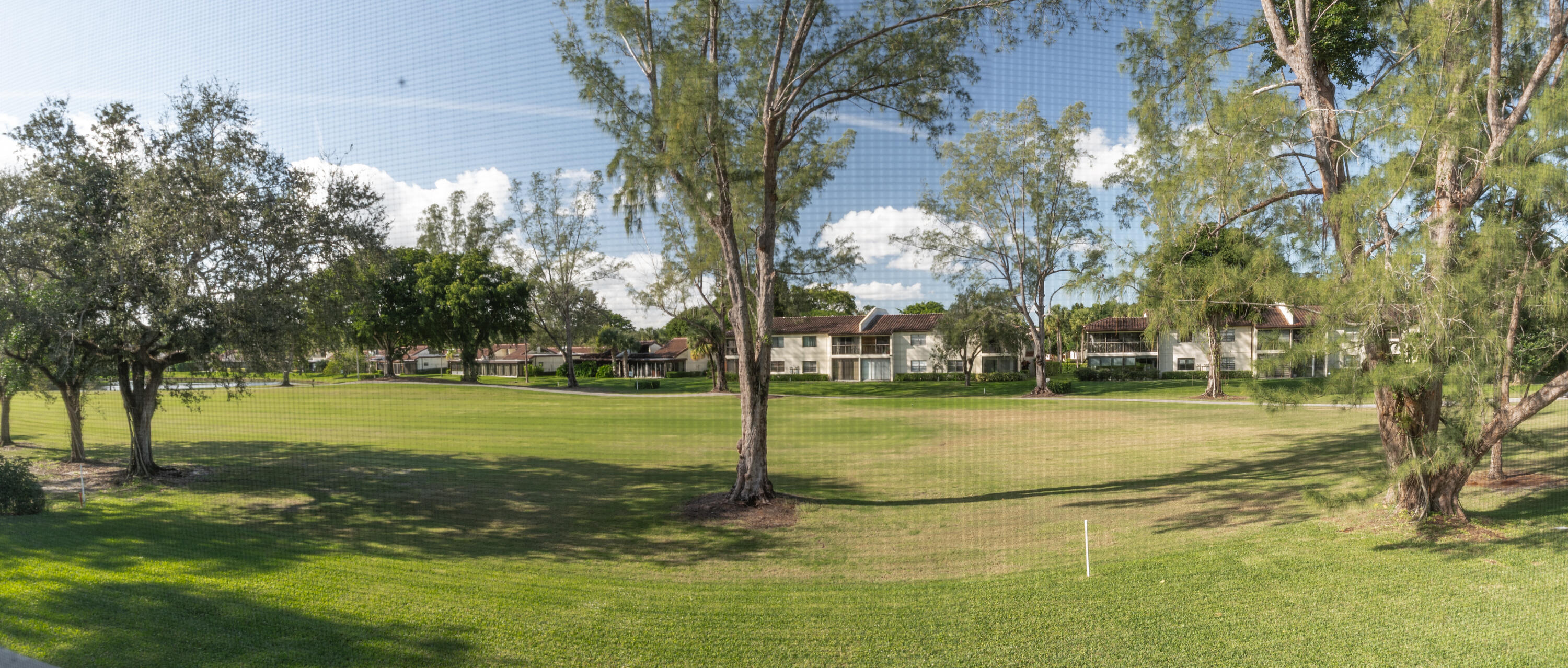 21703 Tall Palm Circle, Unit 5D Boca Raton, FL 33433 - Photo 34 of 36 a view of a playground with basketball court