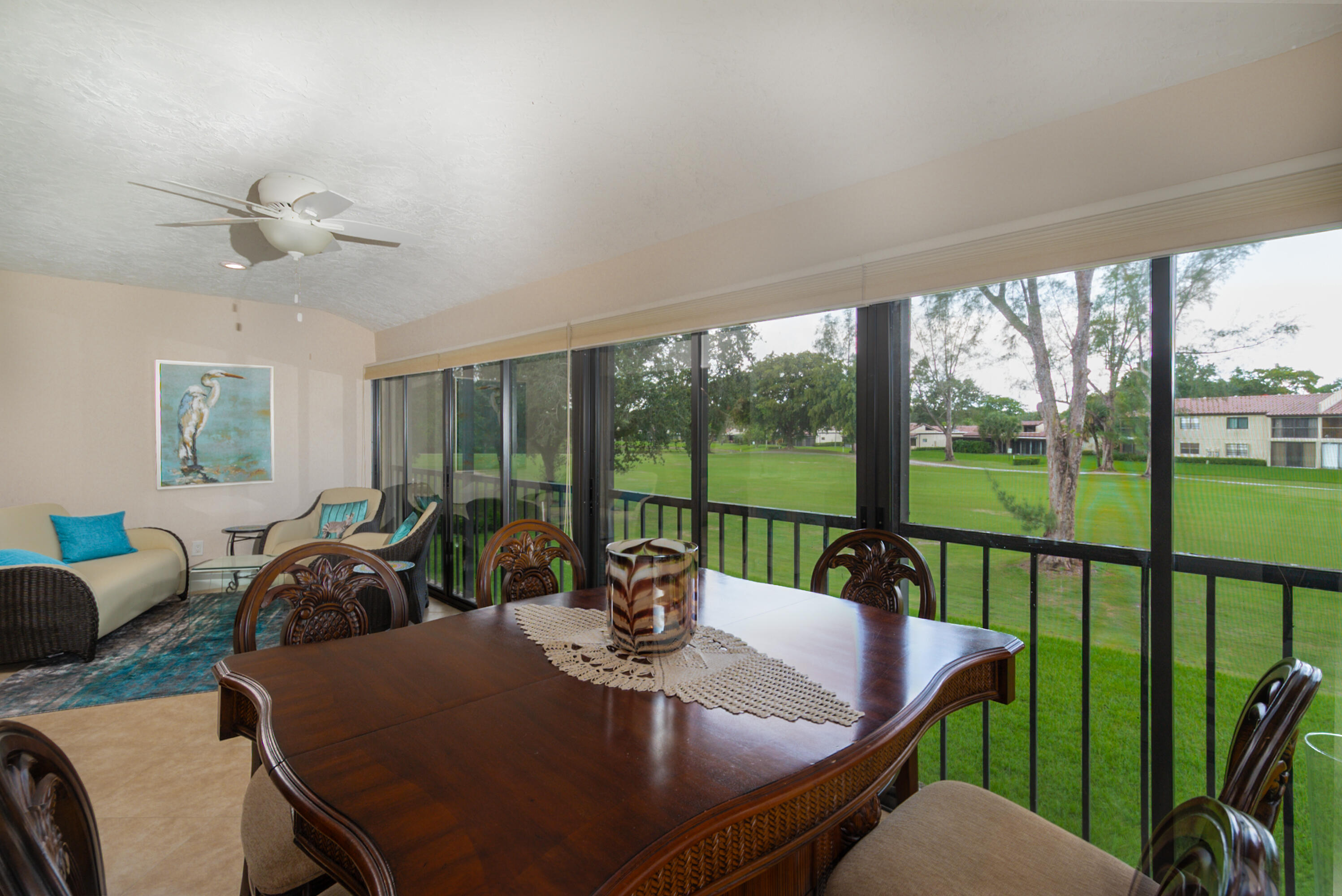 21703 Tall Palm Circle, Unit 5D Boca Raton, FL 33433 - Photo 5 of 36 a view of a dining room with furniture window and outside view