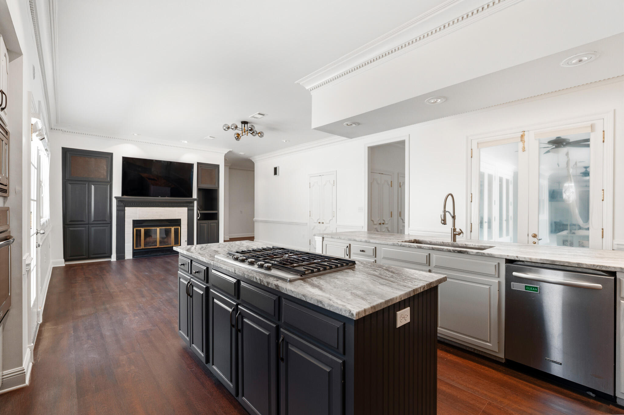 8 Weekewachee Circle Destin, FL 32541 - Photo 12 of 59 a kitchen with a stove and a wooden floor