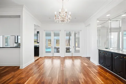 a kitchen with granite countertop a stove and cabinets