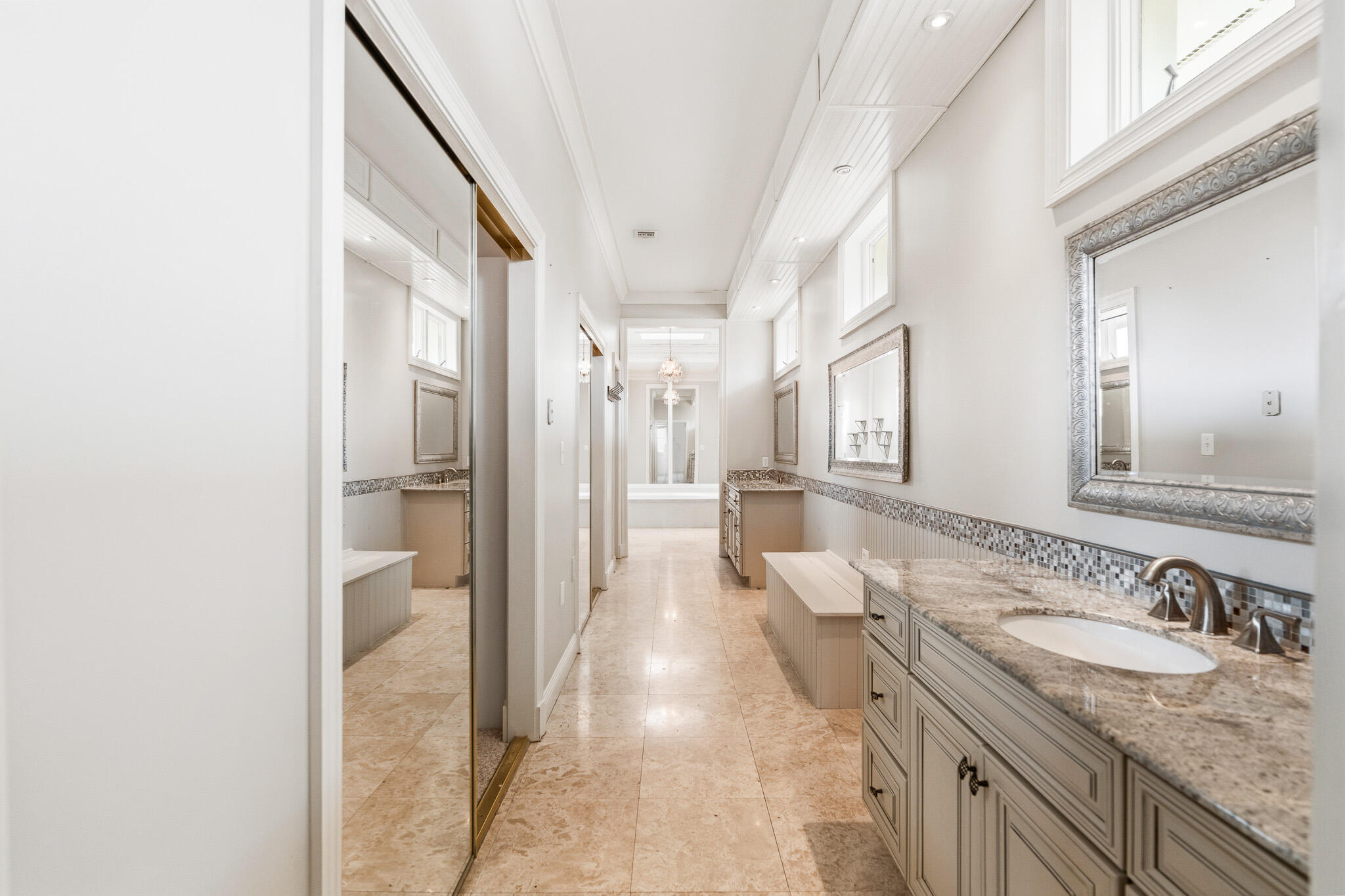 8 Weekewachee Circle Destin, FL 32541 - Photo 32 of 59 a bathroom with a granite countertop sink and a mirror