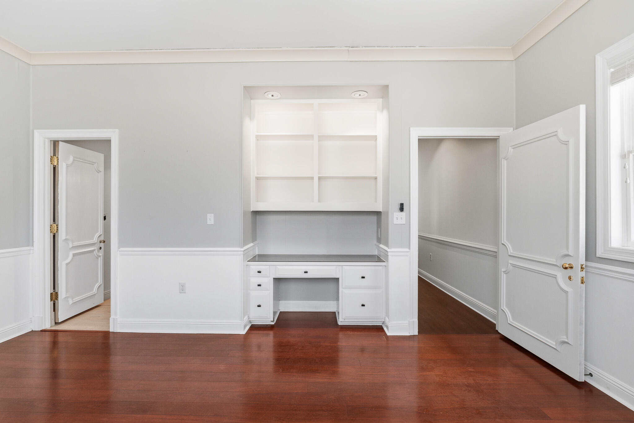8 Weekewachee Circle Destin, FL 32541 - Photo 43 of 59 an empty room with wooden floor cabinet and windows