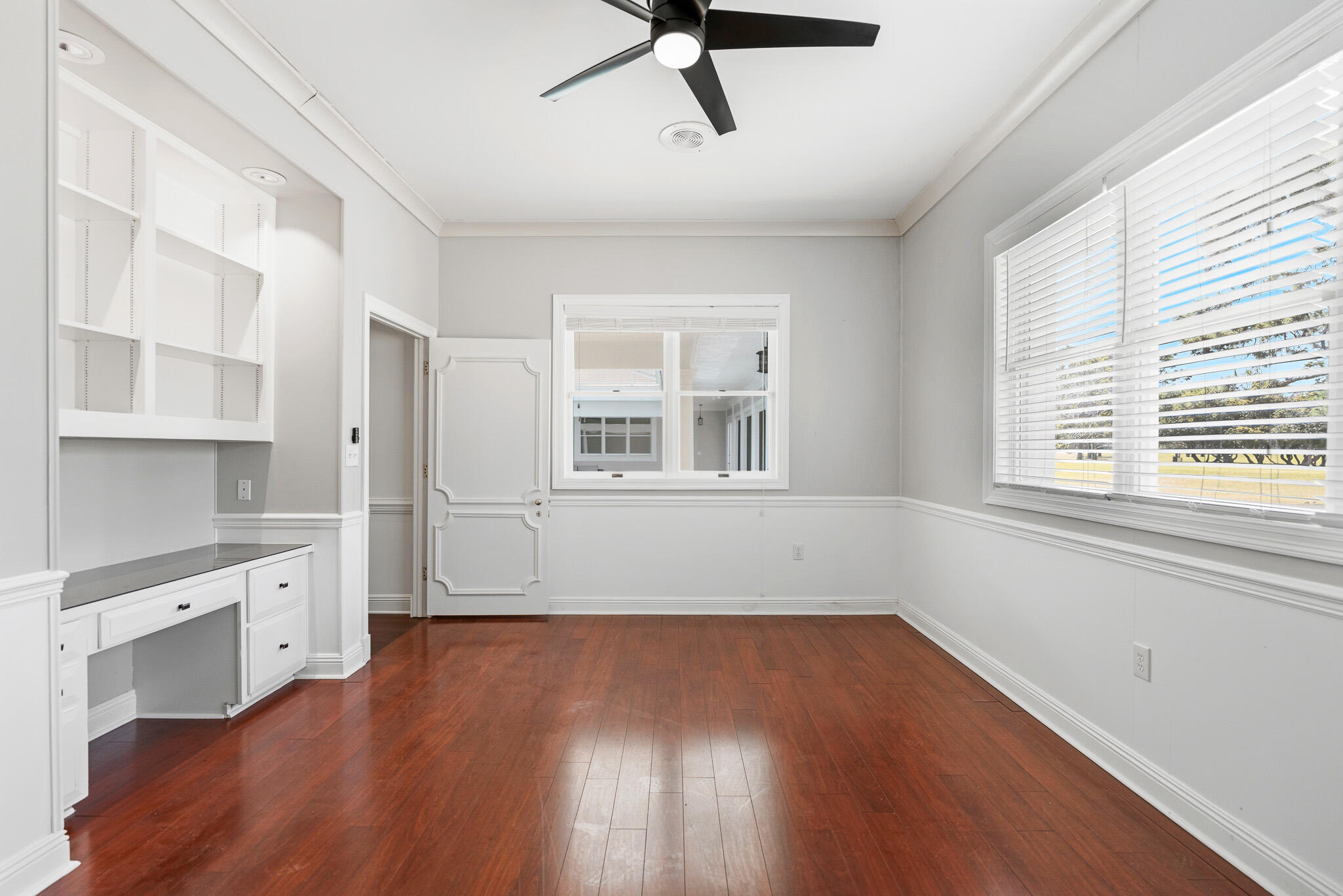 8 Weekewachee Circle Destin, FL 32541 - Photo 45 of 59 a view of empty room with wooden floor and fan